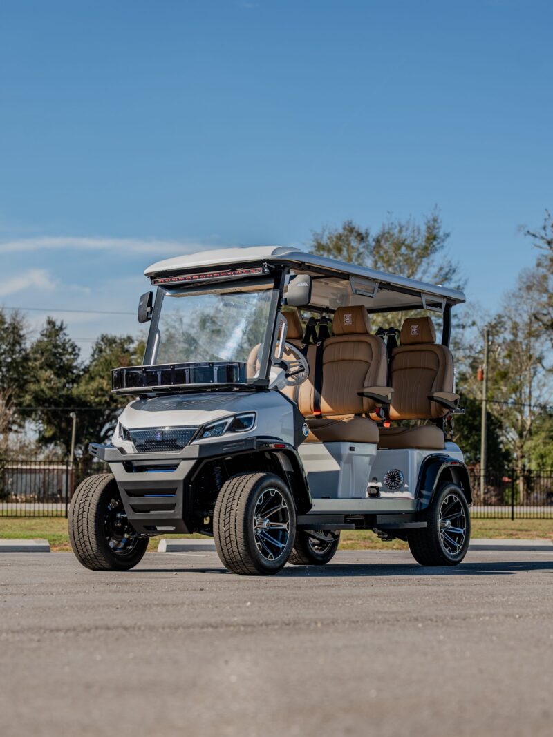 Conquest S40F 4-seater forward-facing golf cart, front three-quarter view