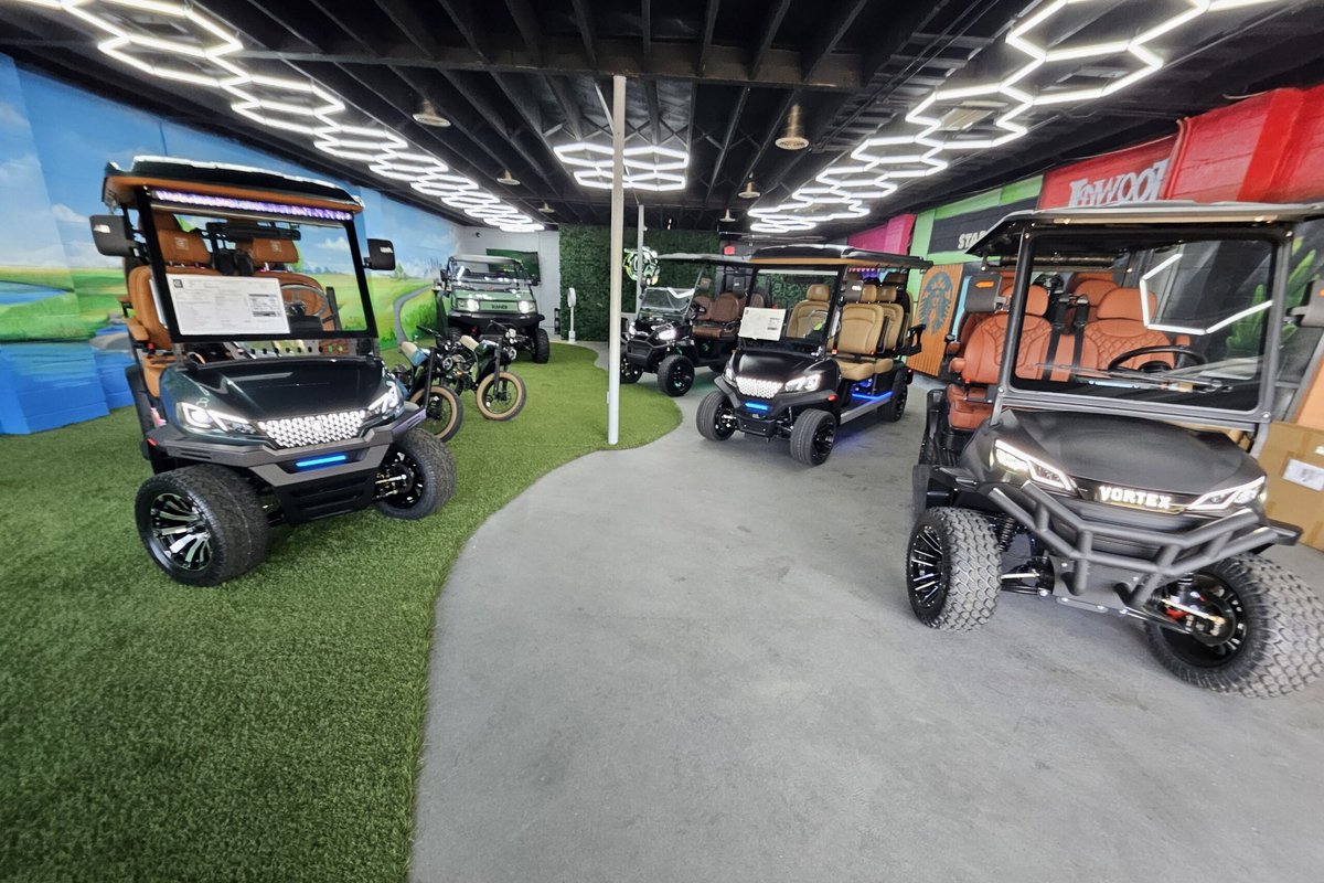 Interior of Family Golf Carts Dallas showroom with lithium-ion golf carts on display
