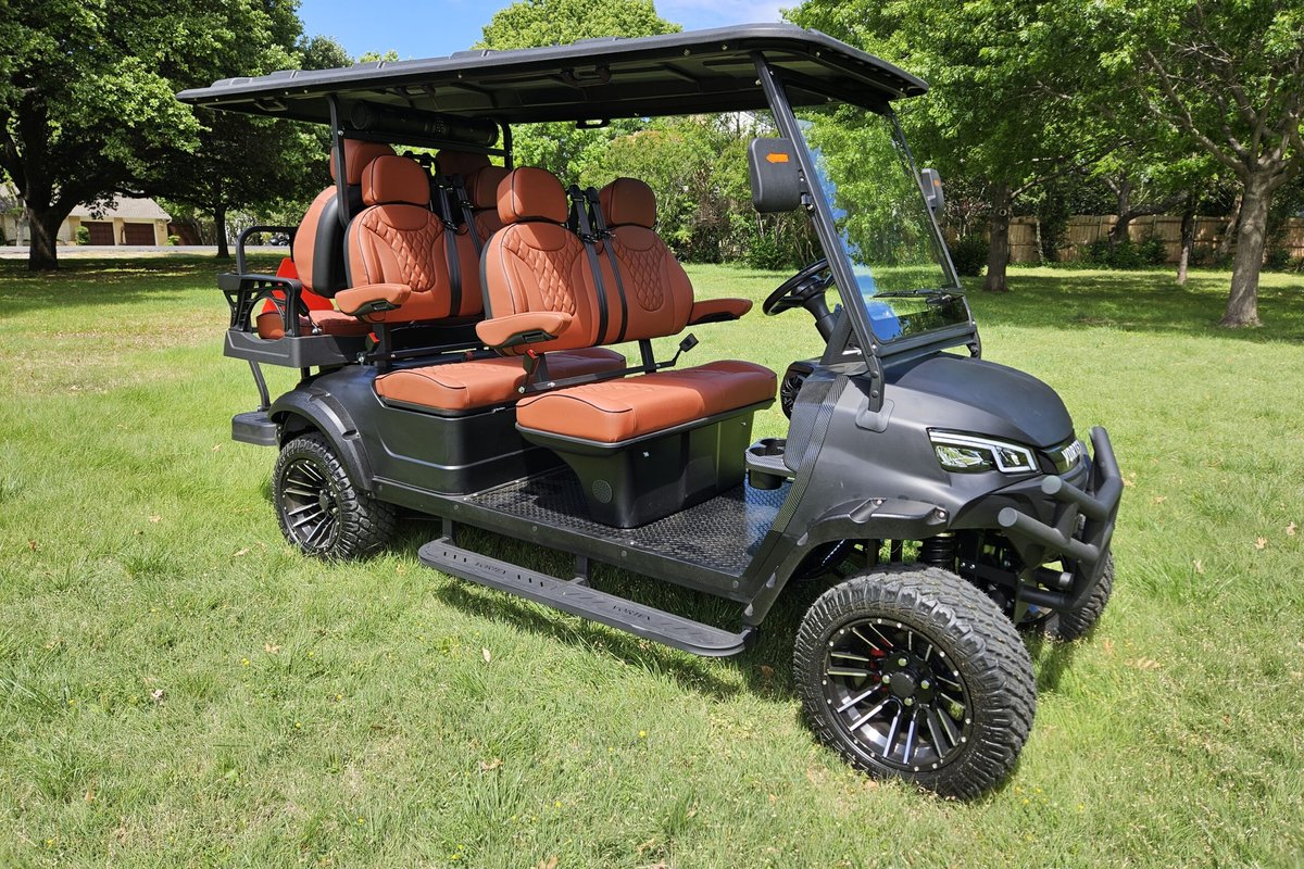 Black lifted six-seat lithium golf cart with tan seats, available at Family Golf Carts Dallas