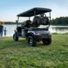 Grey Kandi Kruiser 4Pro Forward parked by a lake while a family fishes