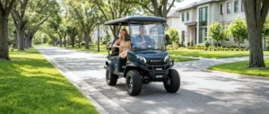 Couple driving a Kandi Kruiser 4Pro on a neighborhood street