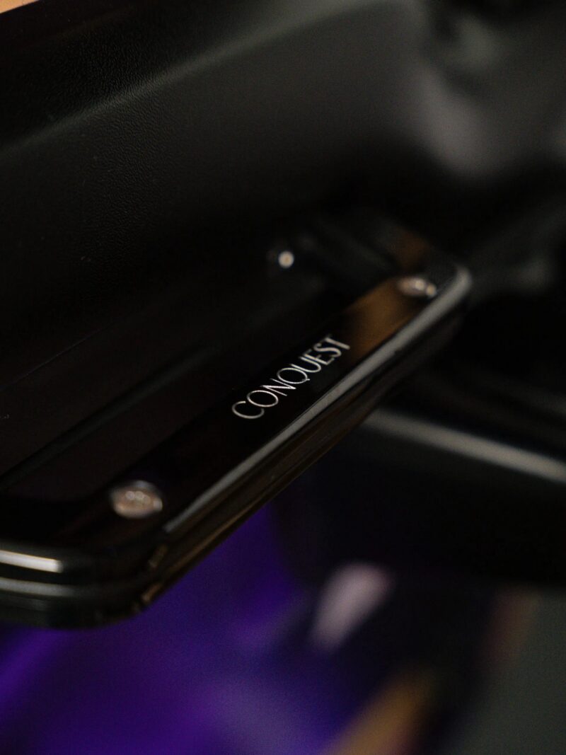 Conquest badge on the dash