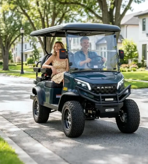 Couple driving a Kandi Kruiser 4Pro on a neighborhood street
